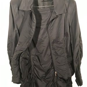 Two piece size 12 black cocktail suit by São Paulo